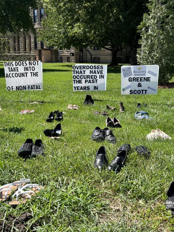 Empty Shoes Line Greene & Scott Courthouse Lawns In Remembrance of International Overdose Awareness Day - Vimarsana News